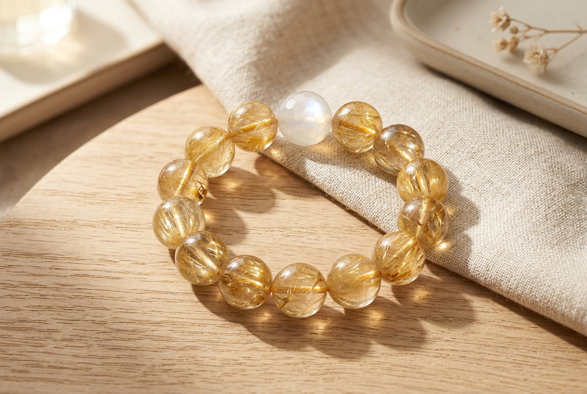 Bracelet with gold beads on a black background