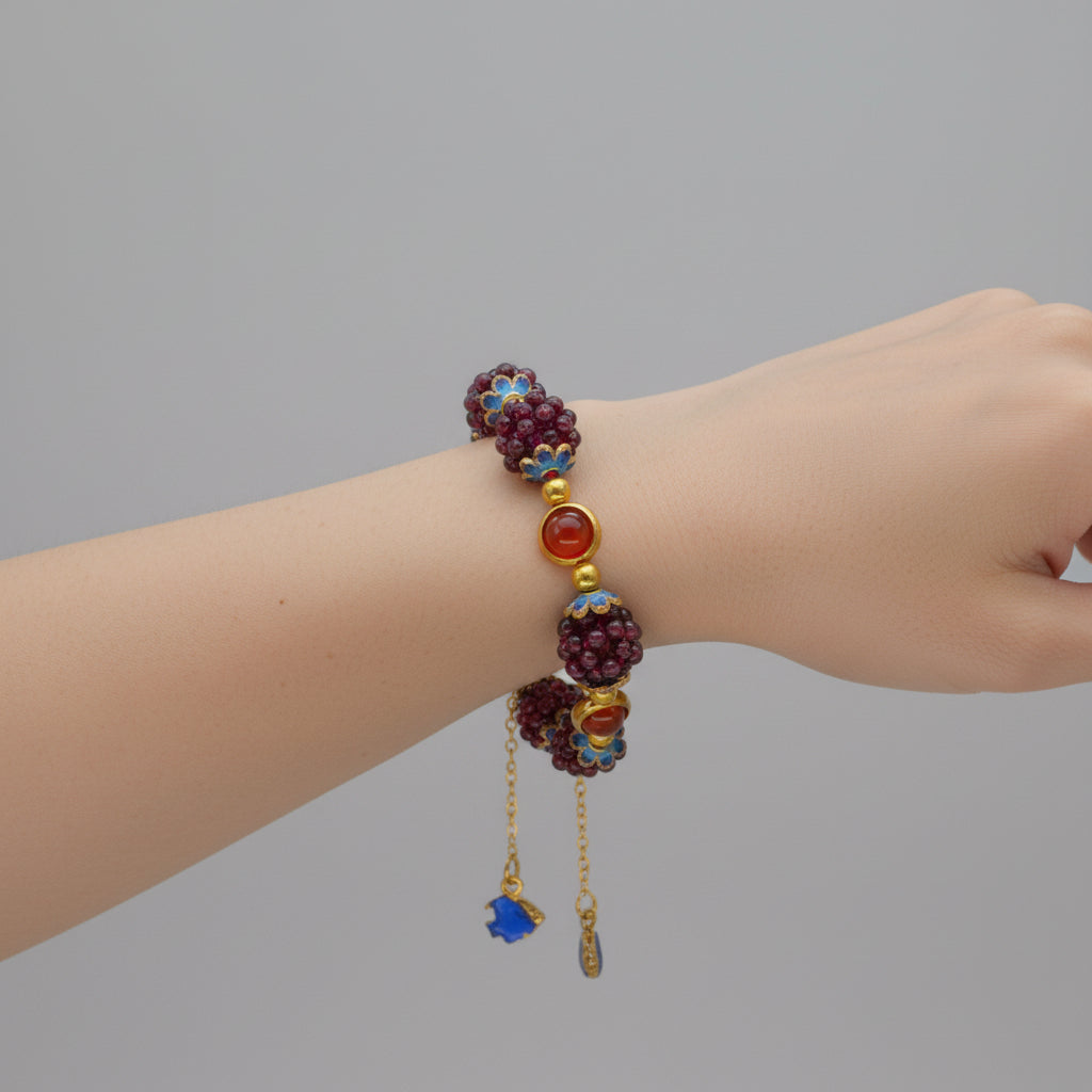 Necklace and earrings with colorful beads on a pink stand against a textured white background