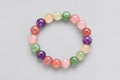 Multicolored beaded bracelet on a black background