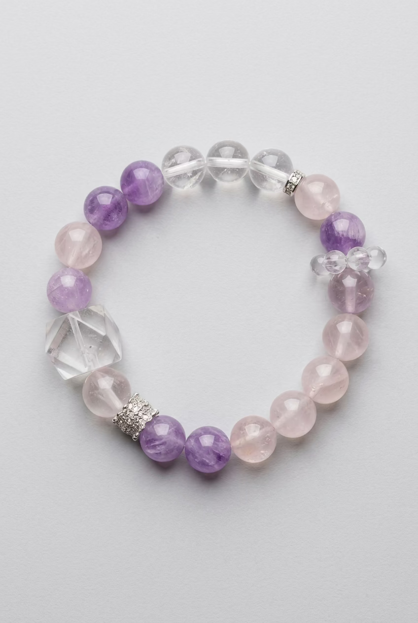 A beaded stretch bracelet featuring light purple amethyst beads, milky white quartz beads, a faceted white crystal, and a small silver-toned cross charm, displayed on a dark textured background.